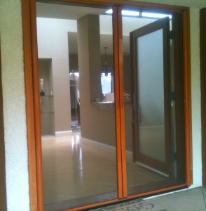 Retractable screen doors for French doors